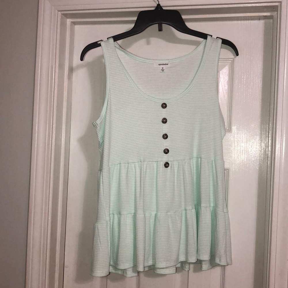 Green-peplum top